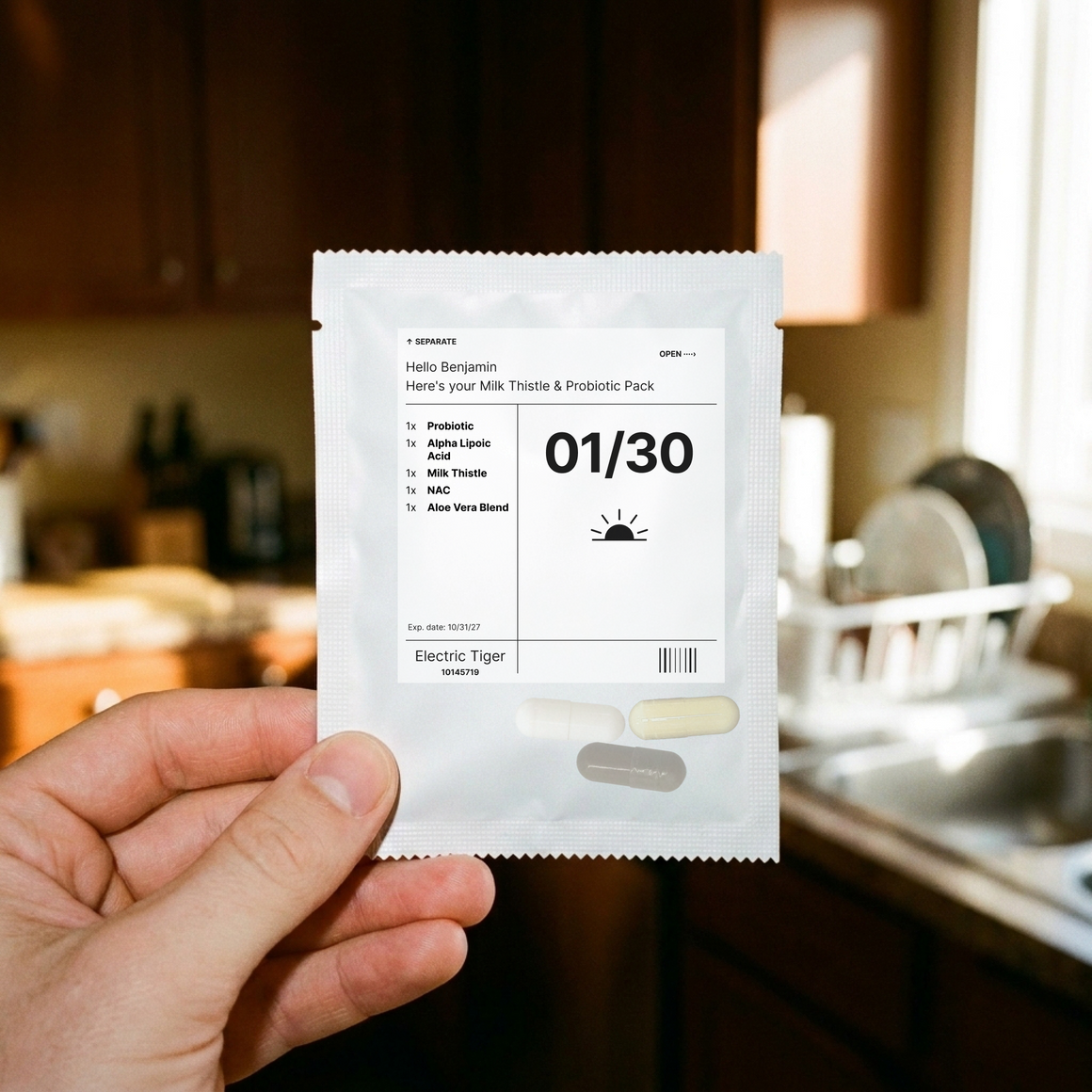 Milk Thistle & Probiotic Pack: one day's pouch, held up in a kitchen